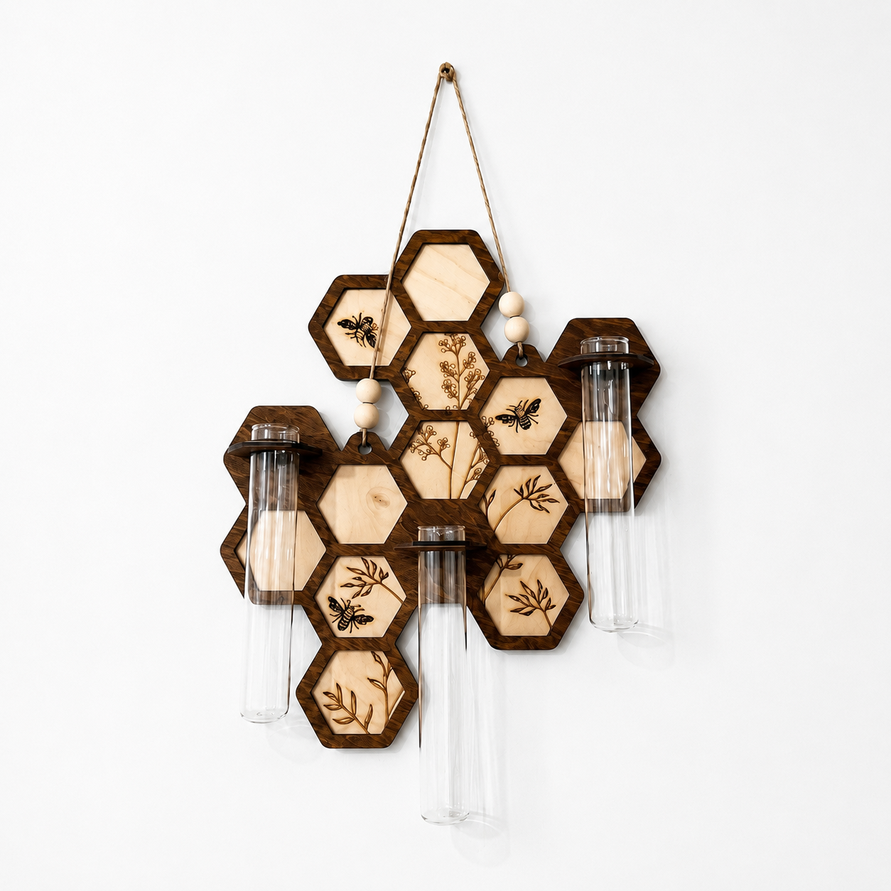 Front profile of handmade honeycomb wall propagation station with engraved bee and botanical details