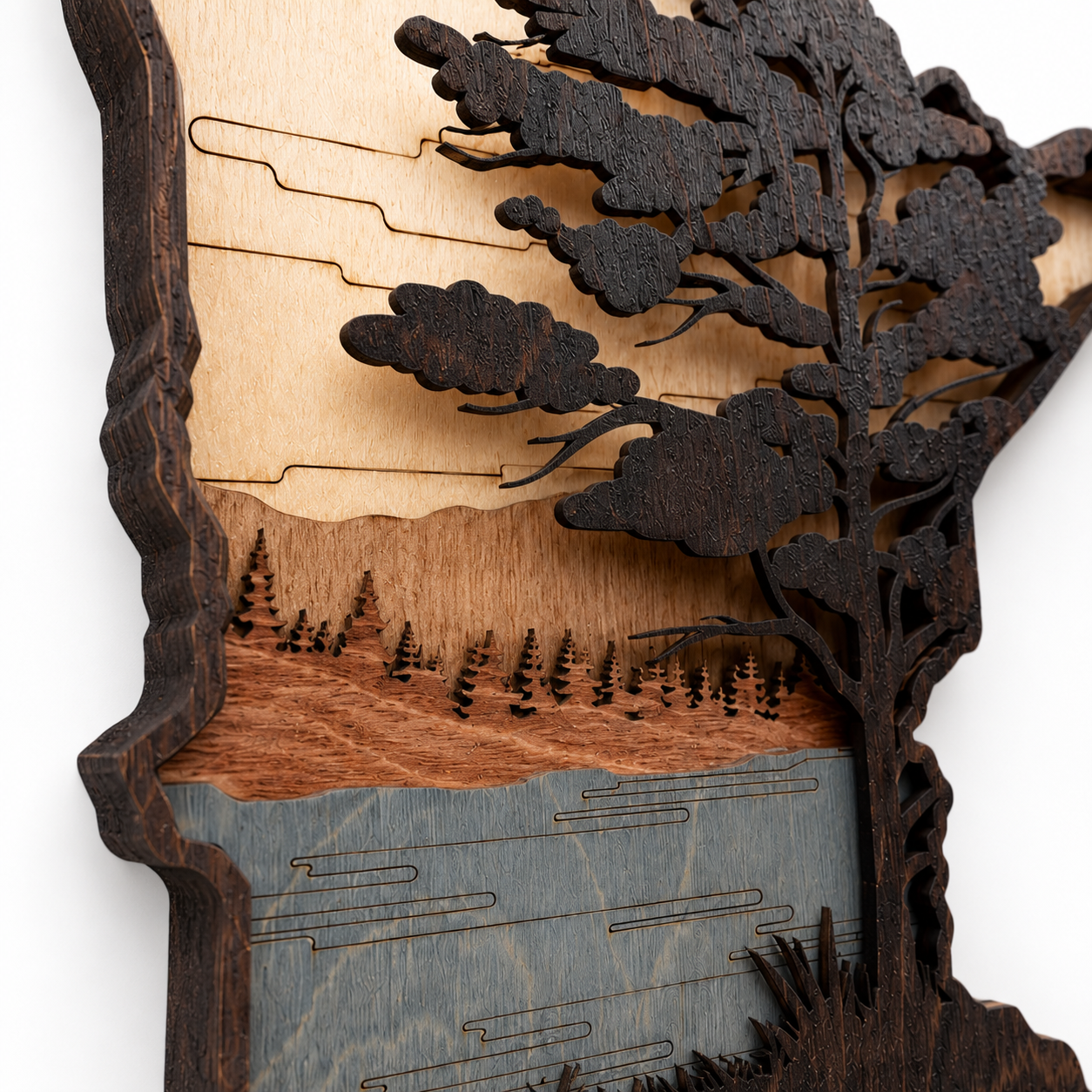Close-up of handcrafted layered wood details on Minnesota wall art showing natural wood grain and laser-cut precision.