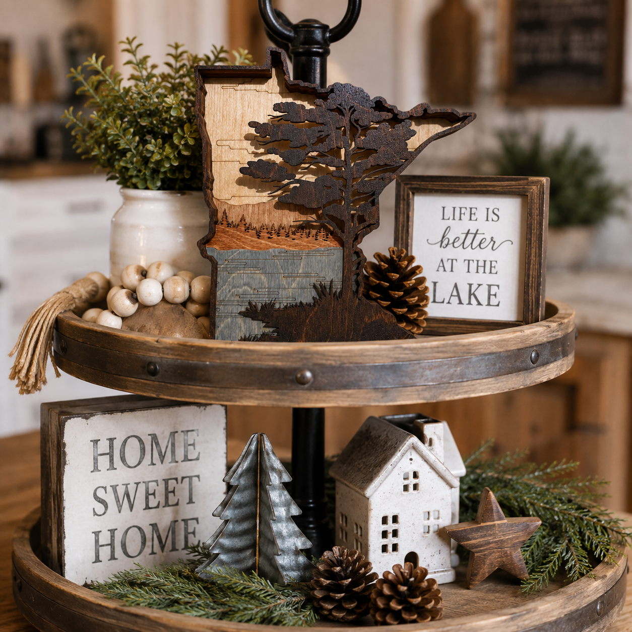 Small Minnesota layered wood art displayed on a rustic tiered tray with cabin-inspired décor.