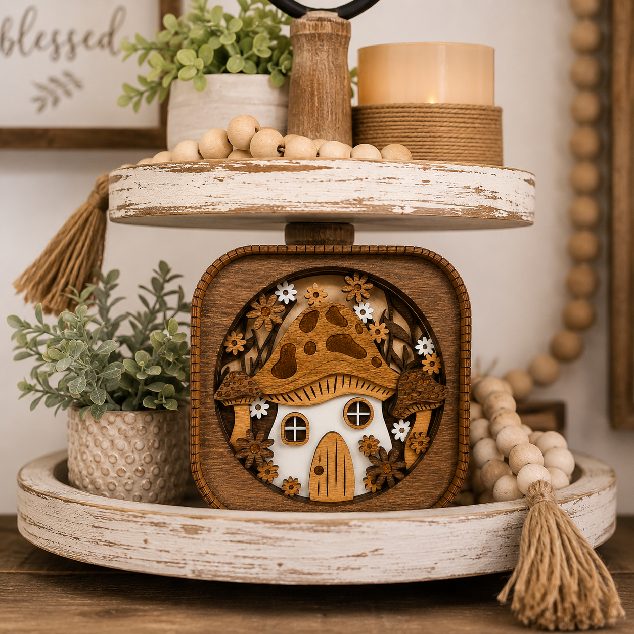 Mushroom house shelf sitter displayed on a farmhouse tiered tray with rustic woodland decor and greenery.