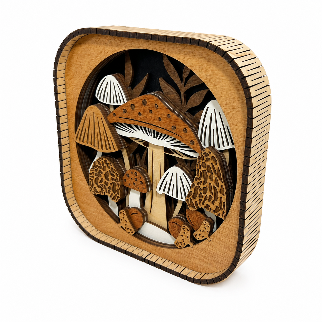 Angled view of 3D mushroom forest wood shelf sitter on a white background showing layered craftsmanship and depth.