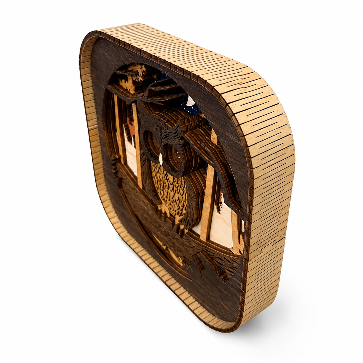 Side view of layered wood owl shelf sitter showing dimensional depth, multiple wood layers, and living hinge frame