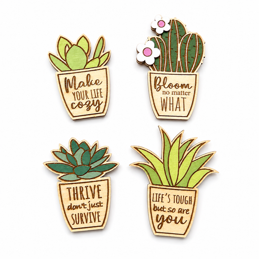 Set of four handmade wooden plant magnets with inspirational sayings displayed on a stainless steel refrigerator.