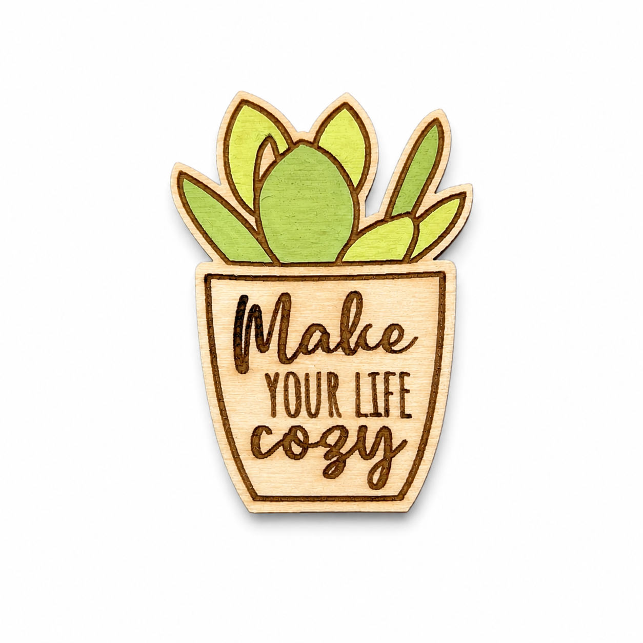 Wooden succulent magnet engraved with Make Your Life Cozy displayed on a white background.