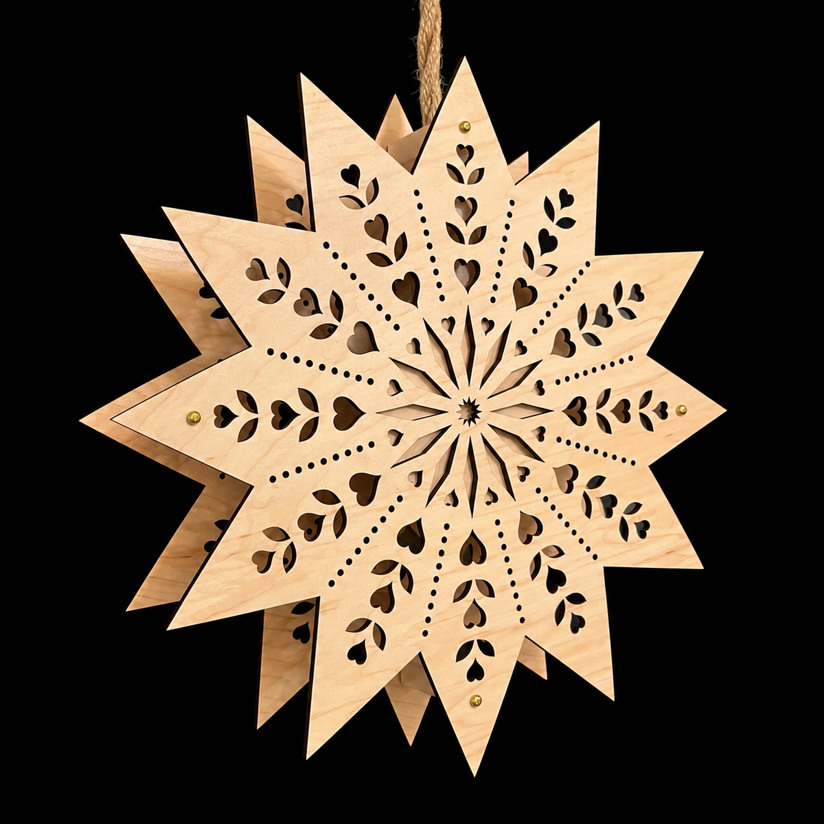 Side angle of wooden star welcome light showing front and back layers and handcrafted construction