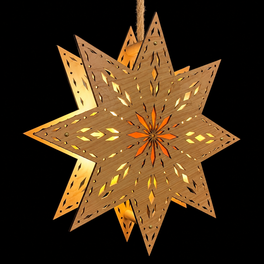 Handcrafted Scandinavian wooden star window light shown at an angle against a black background, featuring layered construction, intricate cutouts and a warm orange glow.