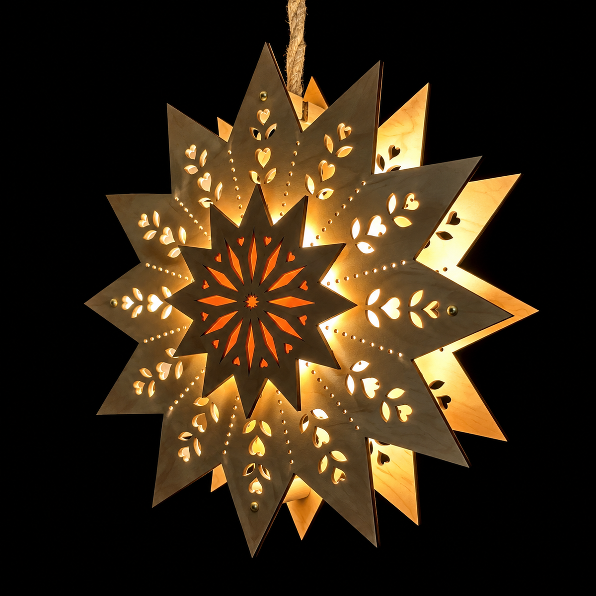 Angled view of a handcrafted wooden Welcome Light showing its raised center star, dimensional layers, and warm light shining through intricate cutouts.