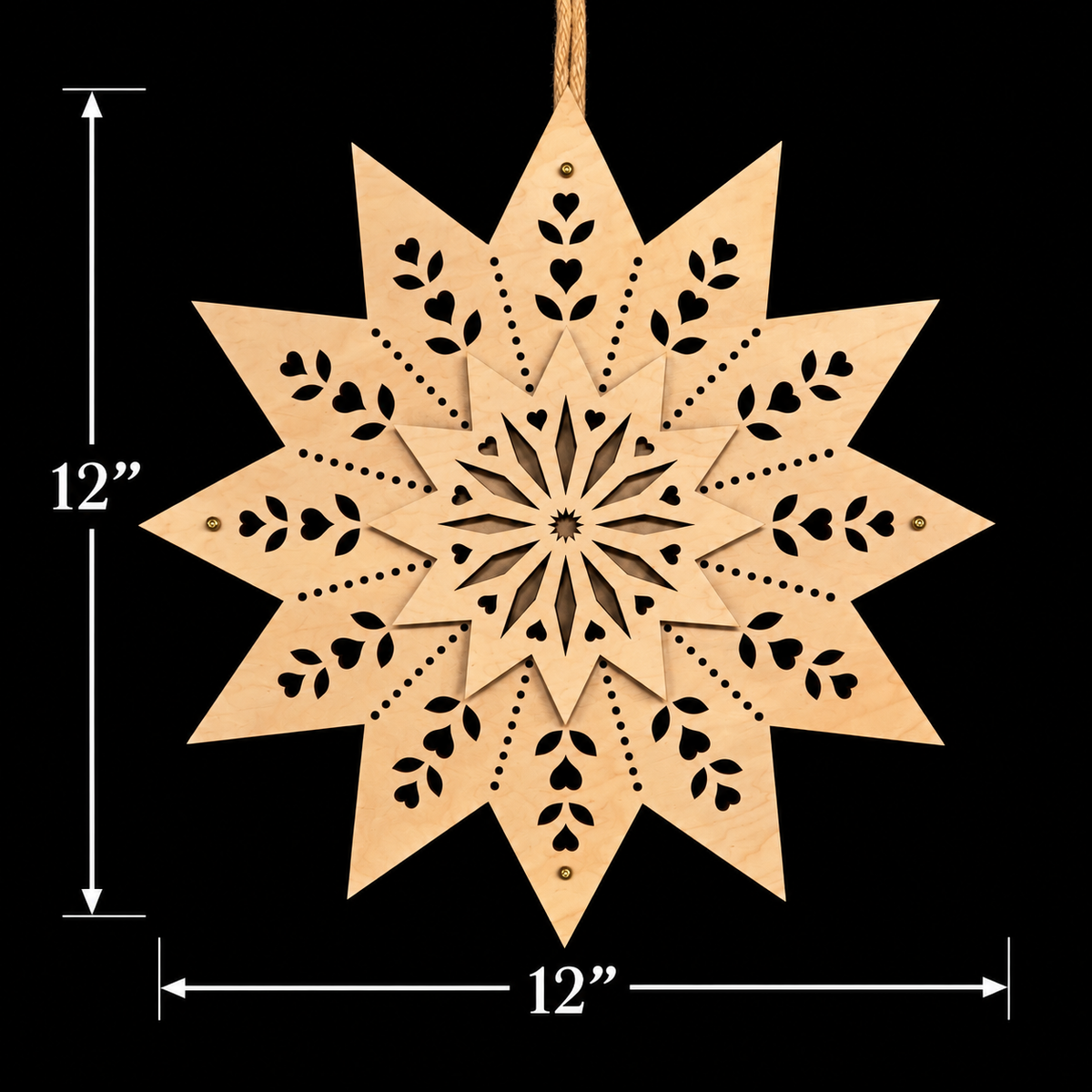Unlit Scandinavian wooden star light with measurement arrows showing its approximately 12-inch height and 12-inch width against a black background.