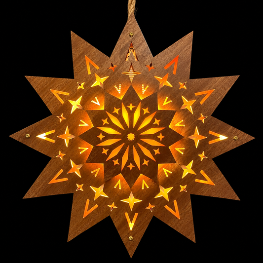 Handcrafted Scandinavian wooden Welcome Light Design 7 glowing warmly against a black background, featuring an intricate double-layered star design.